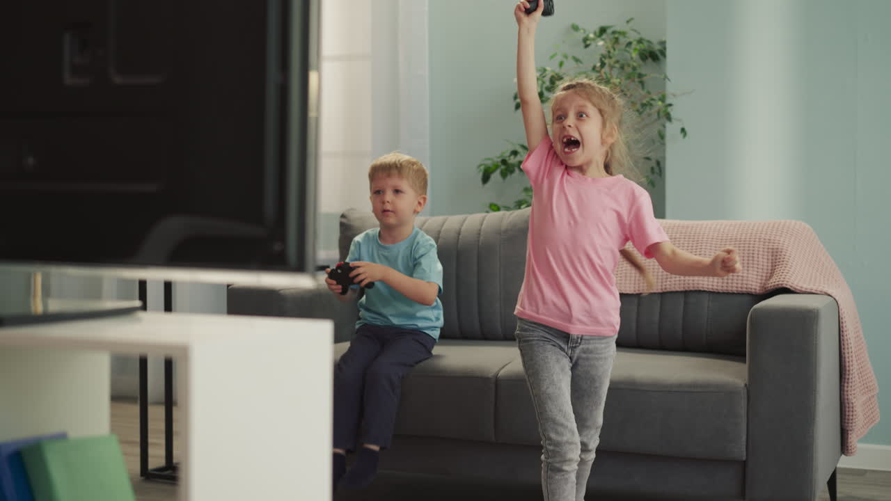 Toothless girl jumps feeling proud and happy to win game