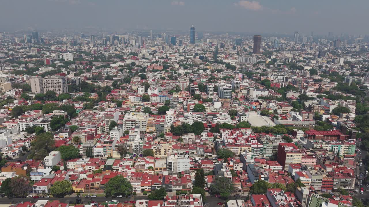 Daytime drone shot of Narvarte neighborhood, Mexico City