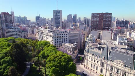 Aerial-view-dolly-in-on-a-sunny-day-and-the-characteristic-European-architecture-of-the-city-of-Buenos-Aires,-Croque-Madame-Palacio-Paz,-Retiro-neighborhood