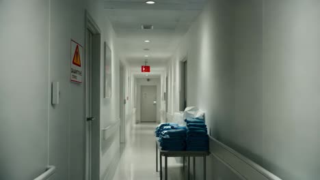 empty hospital corridor with medical supplies