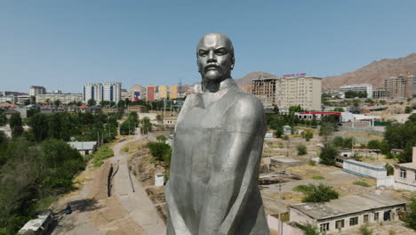 close up view of lenin statue - statuary in panjakent, tajikistan - drone shot