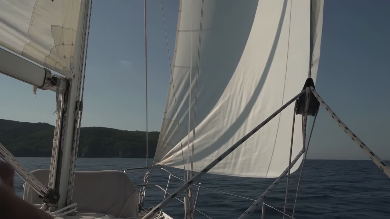 Sailing on the Ocean with a Coastal View