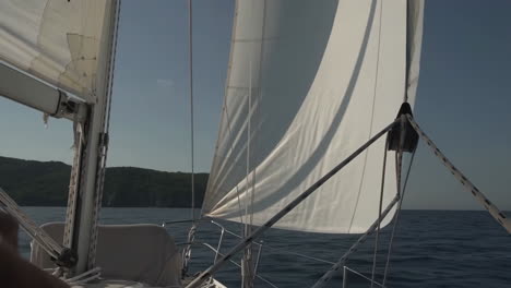 sailing on the ocean with a coastal view