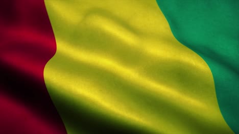 guinea flag waving in the wind. national flag of guinea. sign of guinea seamless loop animation. 4k