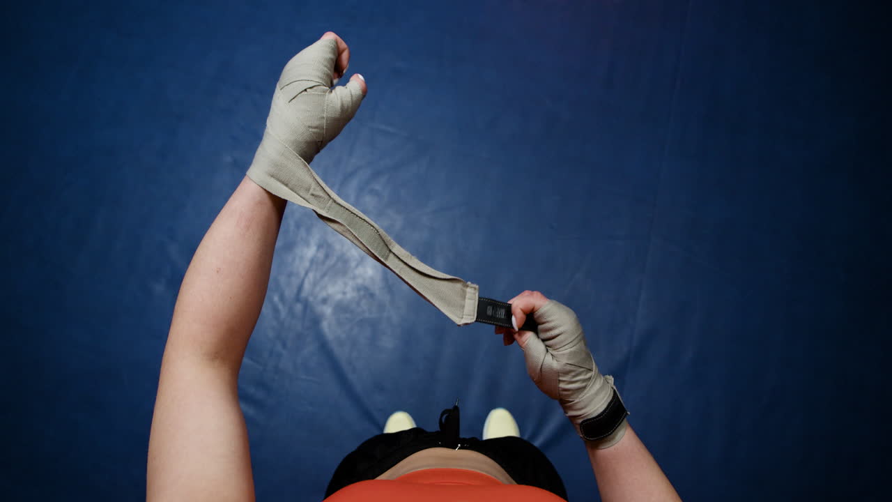 Woman Preparing for Boxing Match