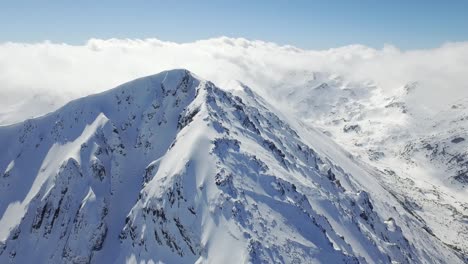 snowy mountain peaks aerial view