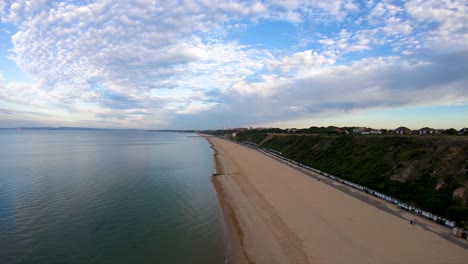 Aerial-Drone-Footage-along-Boscombe-Beach,-Bournemouth,-Dorset