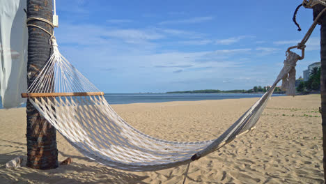 empty cradle with sea beach background