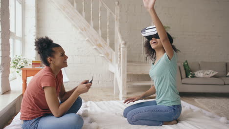 two friends enjoying virtual reality experience at home