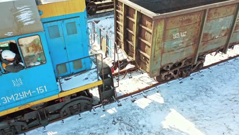 cargo train platform with container. scenic aerial view of mixed freight train at platform