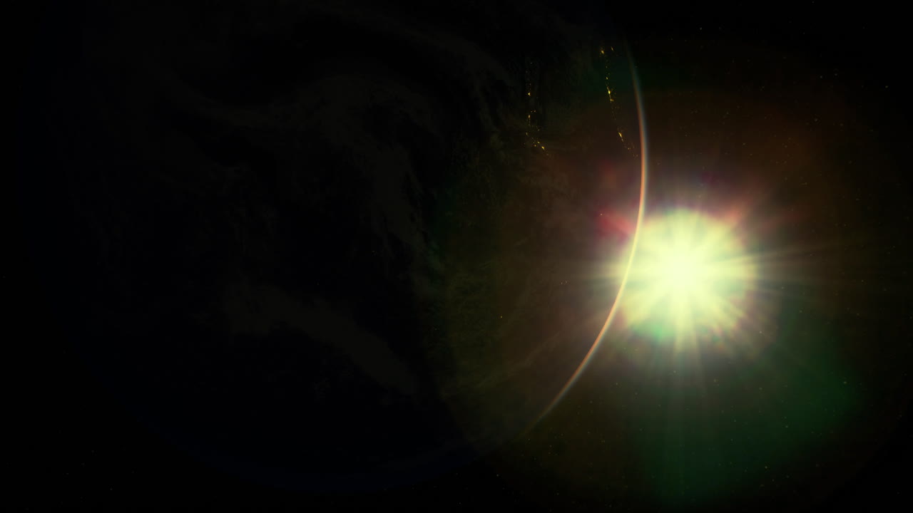 View of earth from space with sun illuminating the horizon