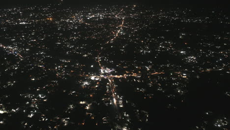 super wide aerial hyperlapse of the town of bo, sierra leone at night.