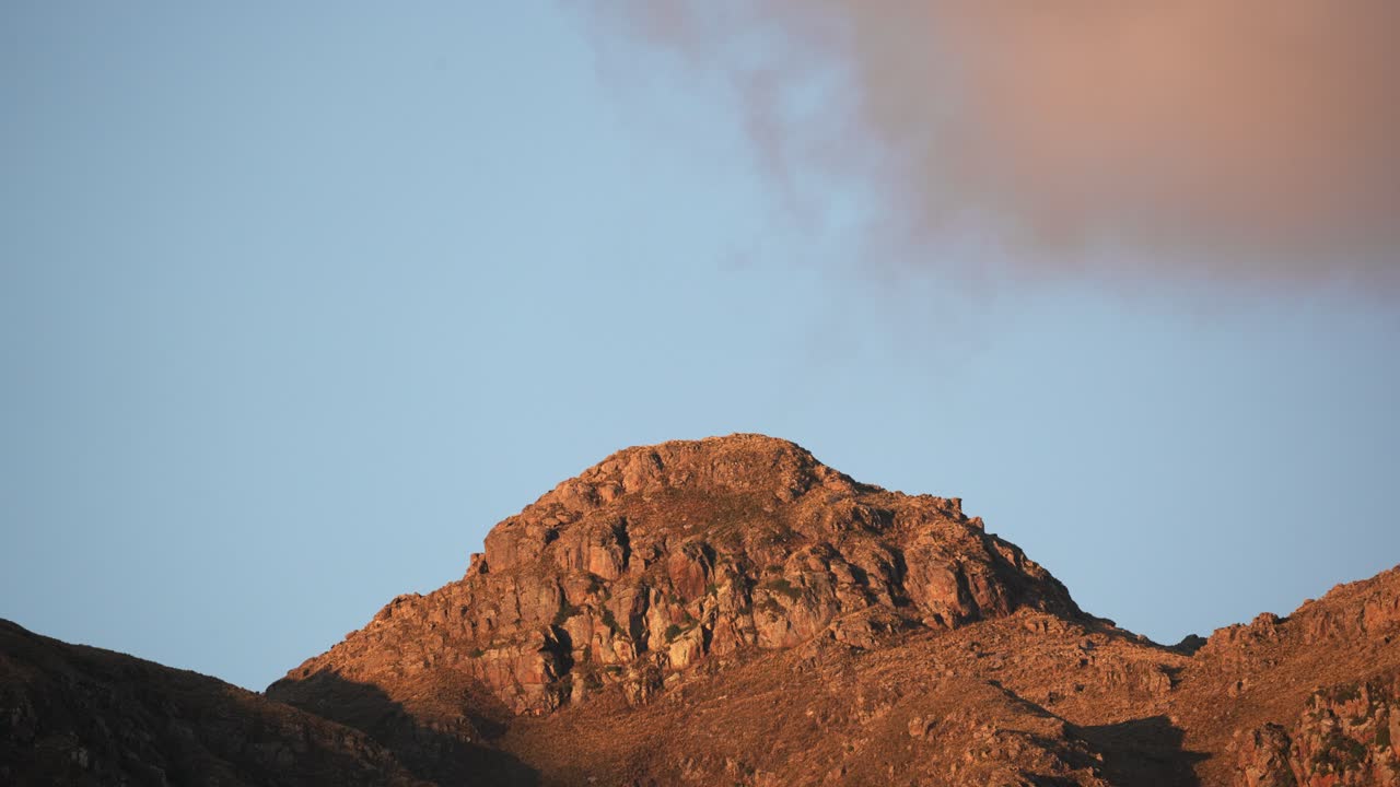 Dramatic sky and clouds at sunset over the mountains. Time-lapse in 4k. Sierras of Cordoba, Argentina