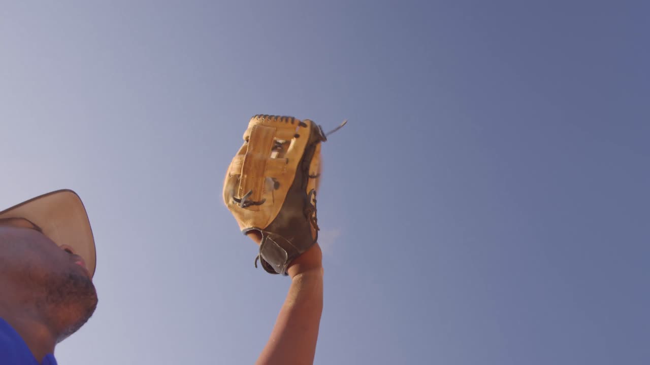 Baseball player catching a ball during a match
