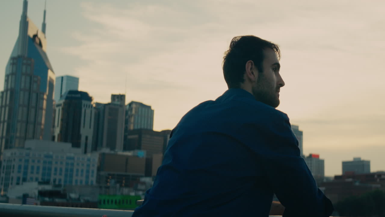 Man overlooking the city skyline