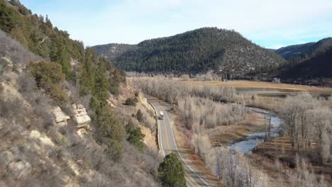 Mountain-View-in-Colorado-with-semi-truck-driving-down-road