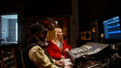 music production session in a recording studio