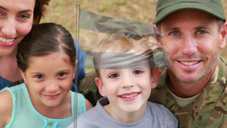 animation of flag of argentia over happy caucasian soldier father embracing wife, son and daughter