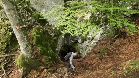 Man walking through Pokljuka Gorge in Slovenia during spring in the Triglav National Park