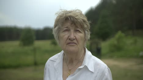 Portrait-of-a-grandmother-looking-at-camera