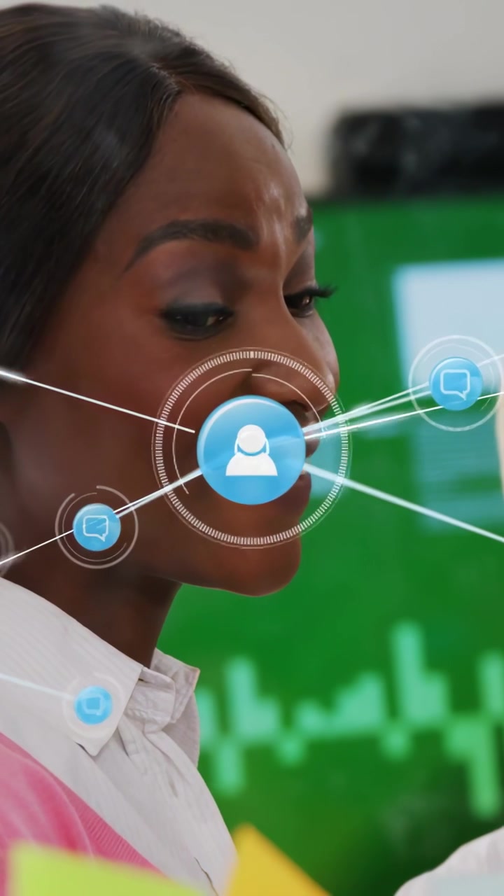 Vertical video: Woman left sharing notes in business meeting, sparking network overlay on graphs