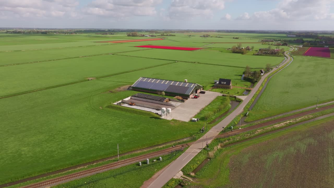 Farm building with rooftop solar array in Obdam, Netherlands