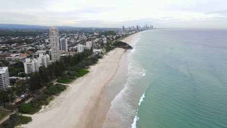 beachfront apartment buildings at burleigh beach in gold coast city, australia