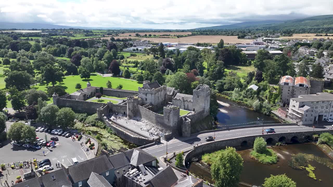 Cahir Castle by river, well preserved ancient building and tourist attraction. Co. Tipperary, Ireland