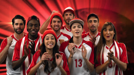 Animation-of-diverse-group-of-sports-fans-cheering-over-glowing-red-trails-in-background