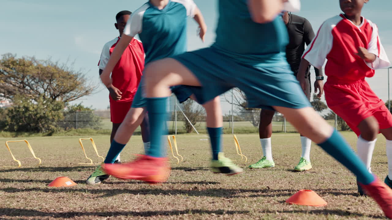 Kids soccer team training with coach