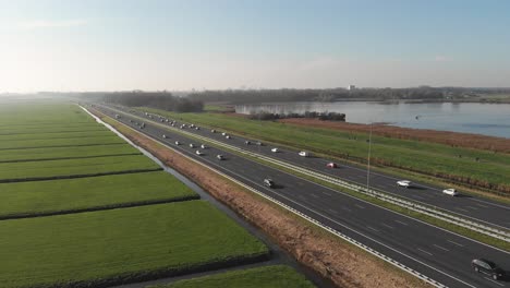 european highway traffic in countryside, inter-city connection, aerial view