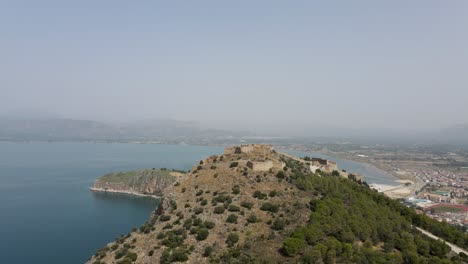 Aerial-drone-video-of-historic-seaside-old-town-of-Nafplio,-Argolida,-Peloponnese,-Greece