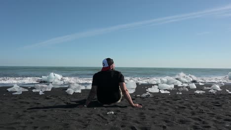 sitting on frozen diamond beach