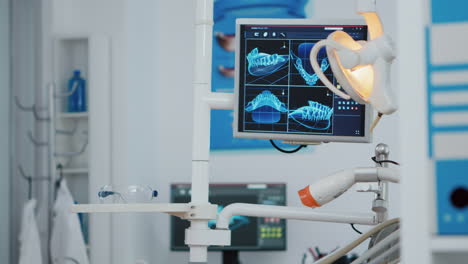 close up of medical orthodontist display with x ray images on it