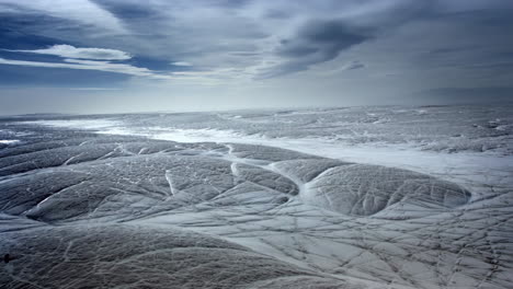 abstract frozen landscape of ice and snow patterns