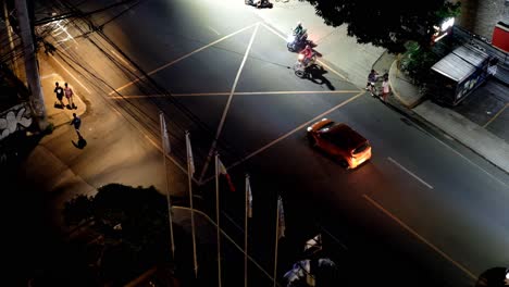 evening traffic at an intersection somewhere in uptown cebu city, philippines.
