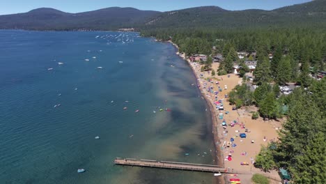 north lake tahoe coast, lake tahoe, ca at daytime - aerial pullback