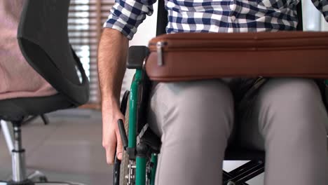 Man's-in-a-wheelchair-at-work