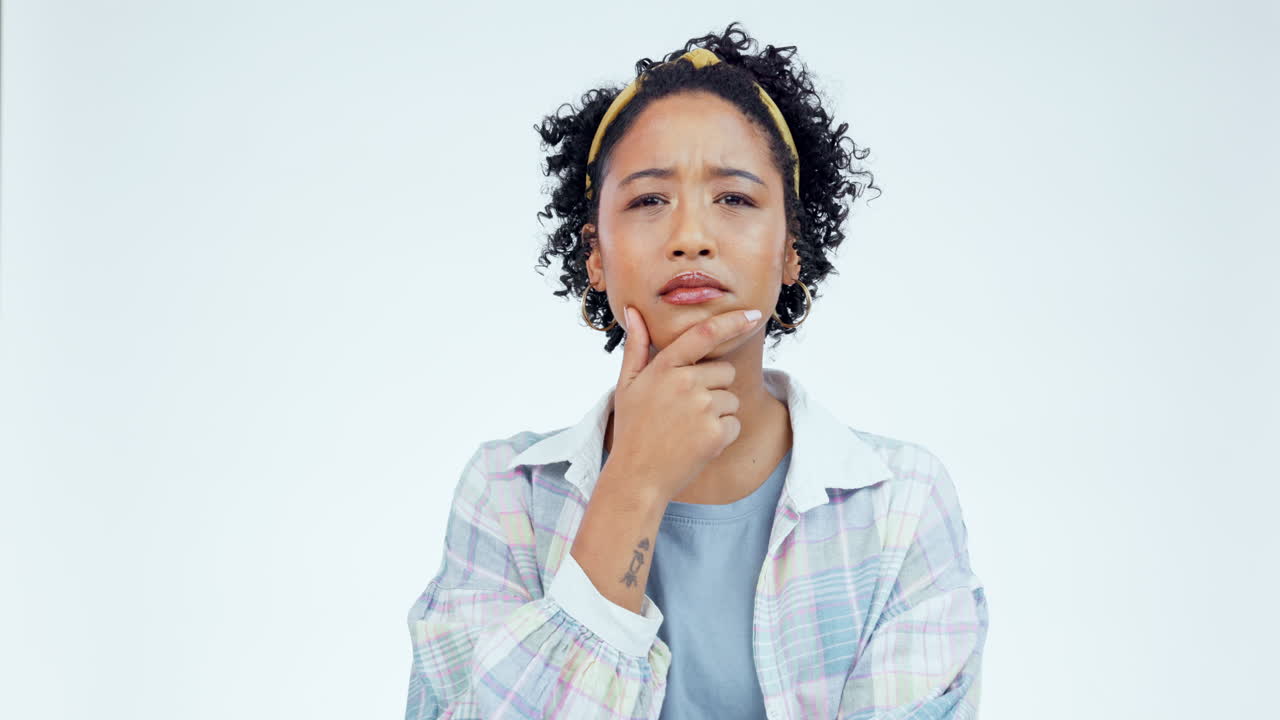 Confused, face and woman in studio thinking