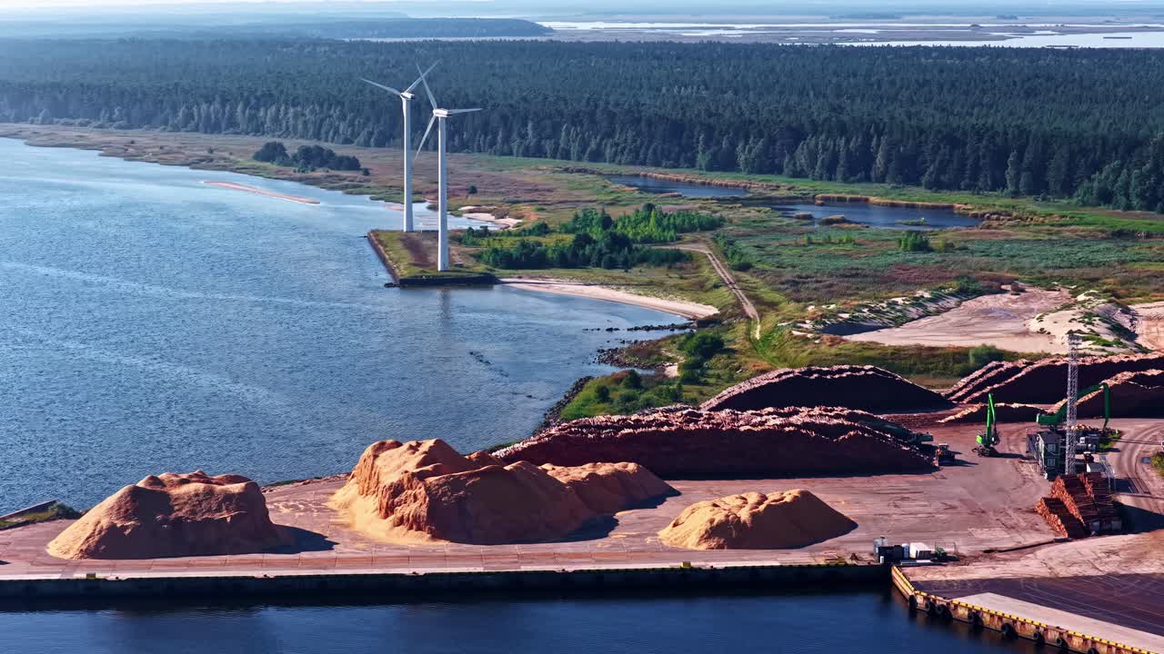 Port industrial area of Ventspils, Latvia with wind turbines Baltic Sea coast