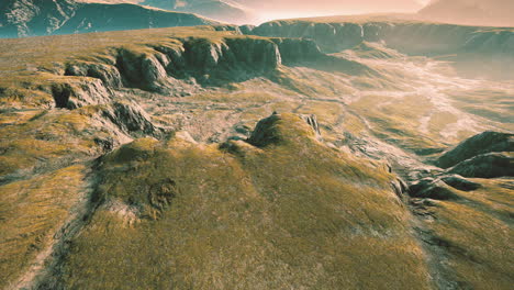 Grasslands-wide-panorama-with-autumn-grass-field-and-mountains