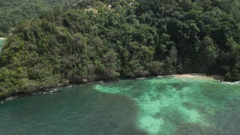 amazing view of a snorkelling spot only accessible by boat in the fishing village of charlottville, tobago