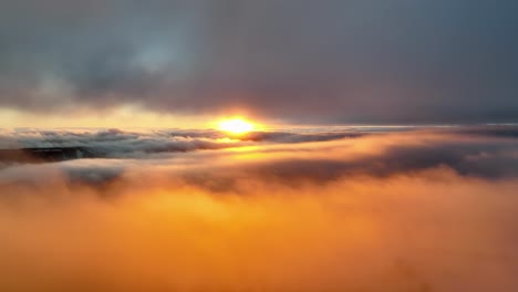 sunrise over the clouds, beautiful bright aerial view