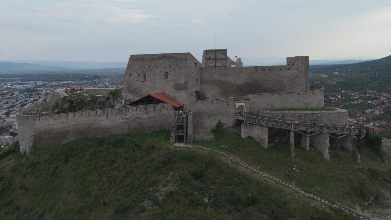 Orbiting smoothly around the Fortress of Deva, showcasing its medieval walls and elevated position above the landscape