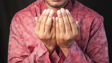 man in prayer posture