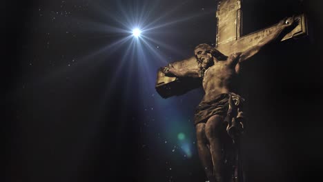 jesus statue with spotlight background