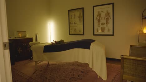 the layout of the massage room is apparent, creating a peaceful ambiance