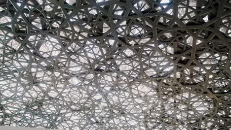 geometric ceiling pattern at the museum of islamic art in doha, qatar