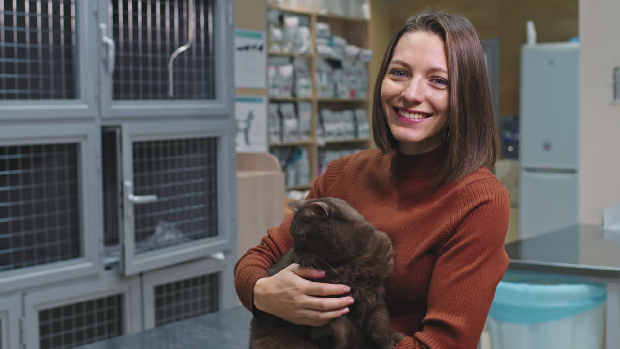 Portrait Of Woman With British Shorthair Cat