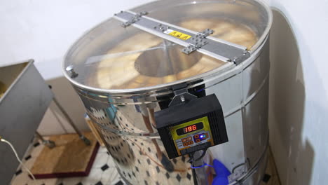 honey extractor in operation